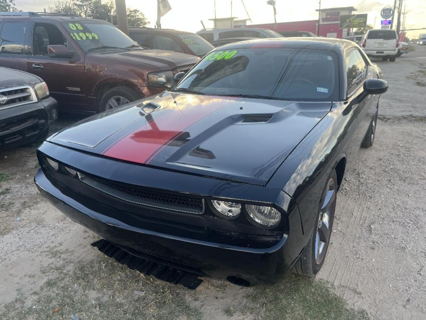 2013 BLACK DODGE CHALLENGER SXT (2C3CDYAG6DH) with an 3.6L V6 DOHC 24V engine, AUTOMATIC transmission, located at 2303 West Mt. Houston, Houston, 77038, (281) 507-3956, 29.771597, -95.339569 - Photo#2