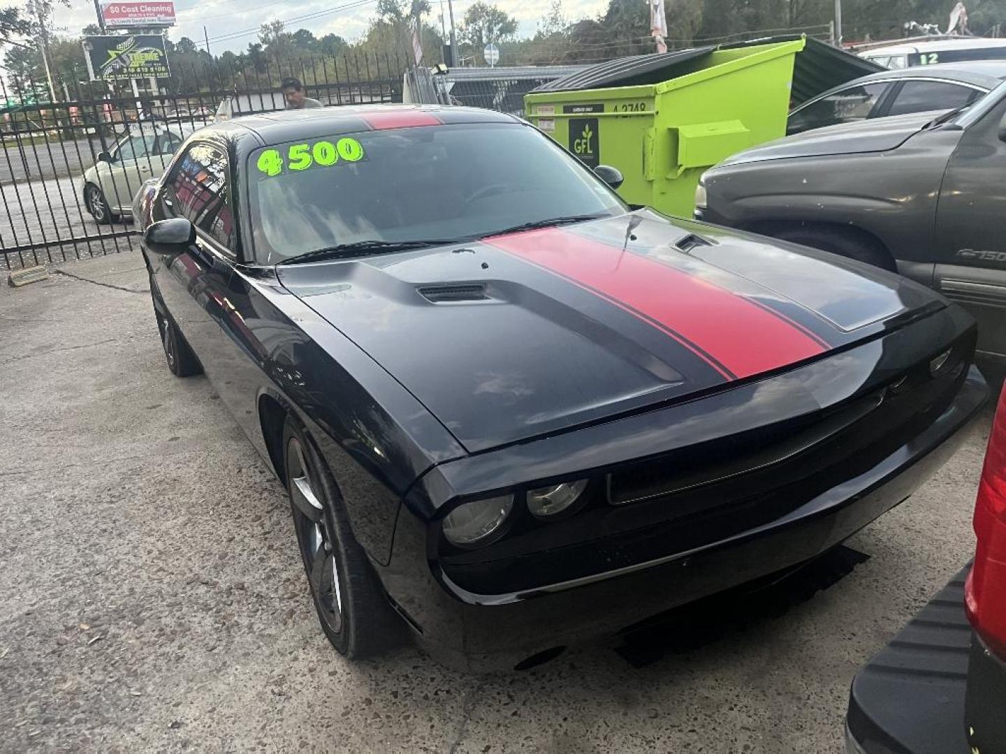 2013 BLACK DODGE CHALLENGER SXT (2C3CDYAG6DH) with an 3.6L V6 DOHC 24V engine, AUTOMATIC transmission, located at 2303 West Mt. Houston, Houston, 77038, (281) 507-3956, 29.771597, -95.339569 - Photo#3