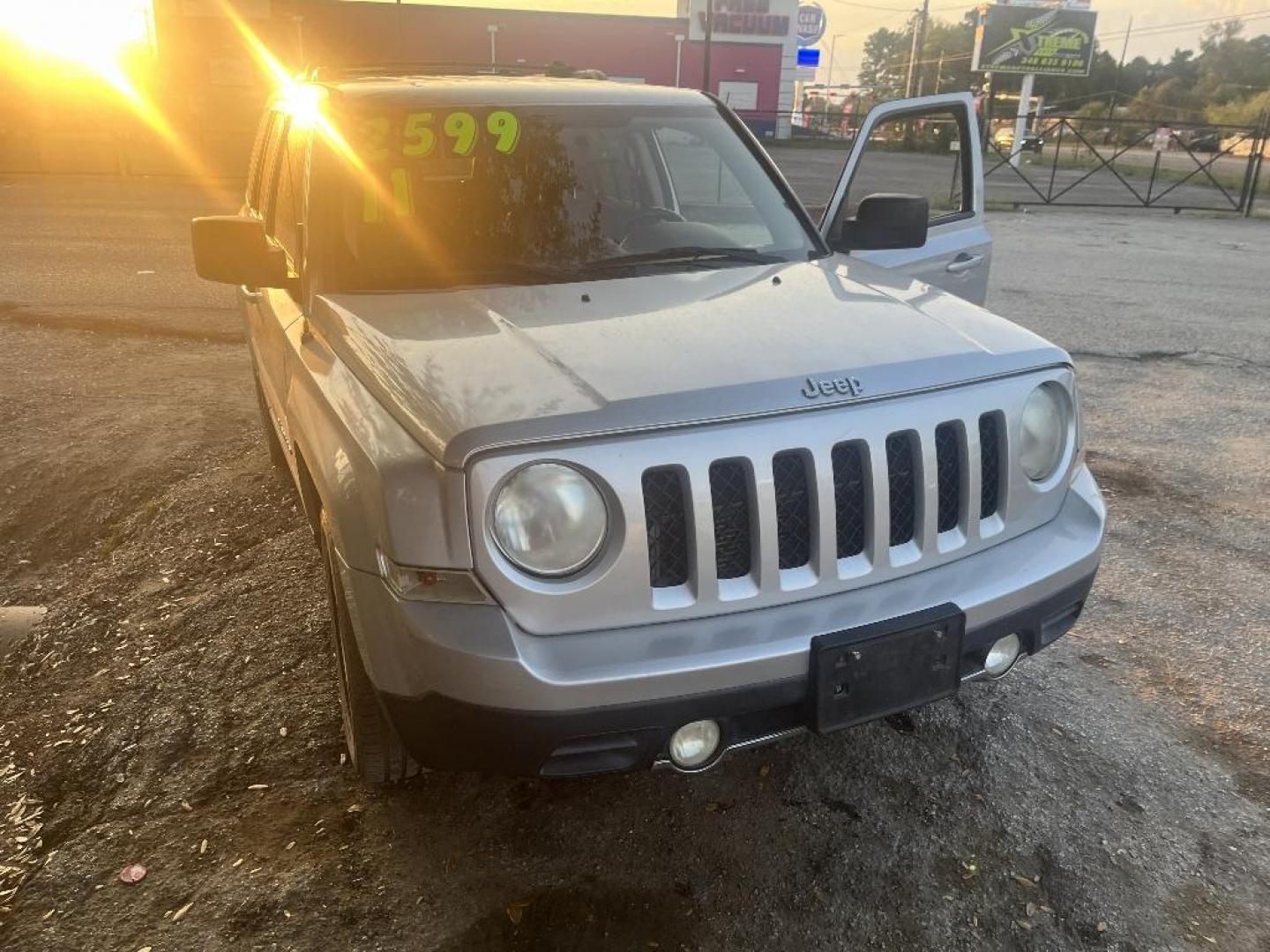 2011 GRAY JEEP PATRIOT Latitude X 4WD (1J4NF4GB2BD) with an 2.4L L4 DOHC 16V engine, AUTOMATIC transmission, located at 2303 West Mt. Houston, Houston, 77038, (281) 507-3956, 29.771597, -95.339569 - Photo#0