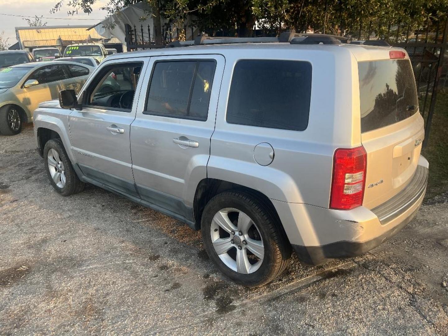 2011 GRAY JEEP PATRIOT Latitude X 4WD (1J4NF4GB2BD) with an 2.4L L4 DOHC 16V engine, AUTOMATIC transmission, located at 2303 West Mt. Houston, Houston, 77038, (281) 507-3956, 29.771597, -95.339569 - Photo#3
