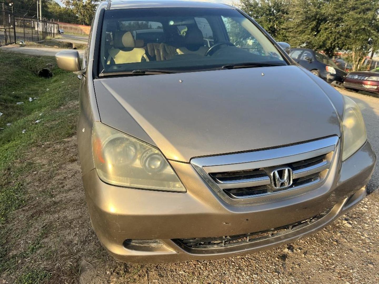 2006 BROWN HONDA ODYSSEY EX-L w/ DVD (5FNRL38746B) with an 3.5L V6 SOHC 24V engine, AUTOMATIC transmission, located at 2303 West Mt. Houston, Houston, 77038, (281) 507-3956, 29.771597, -95.339569 - Photo#0