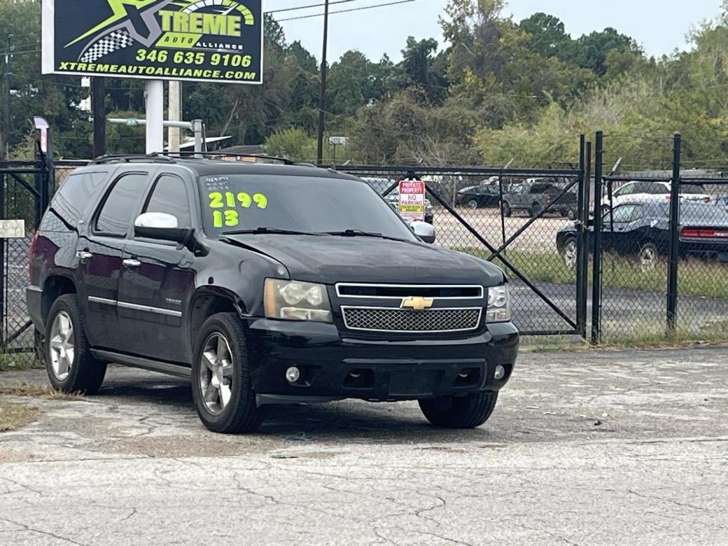 2013 BLACK CHEVROLET TAHOE LTZ 4WD (1GNSKCE04DR) with an 5.3L V8 OHV 16V FFV engine, AUTOMATIC transmission, located at 2303 West Mt. Houston, Houston, 77038, (281) 507-3956, 29.771597, -95.339569 - Photo#0