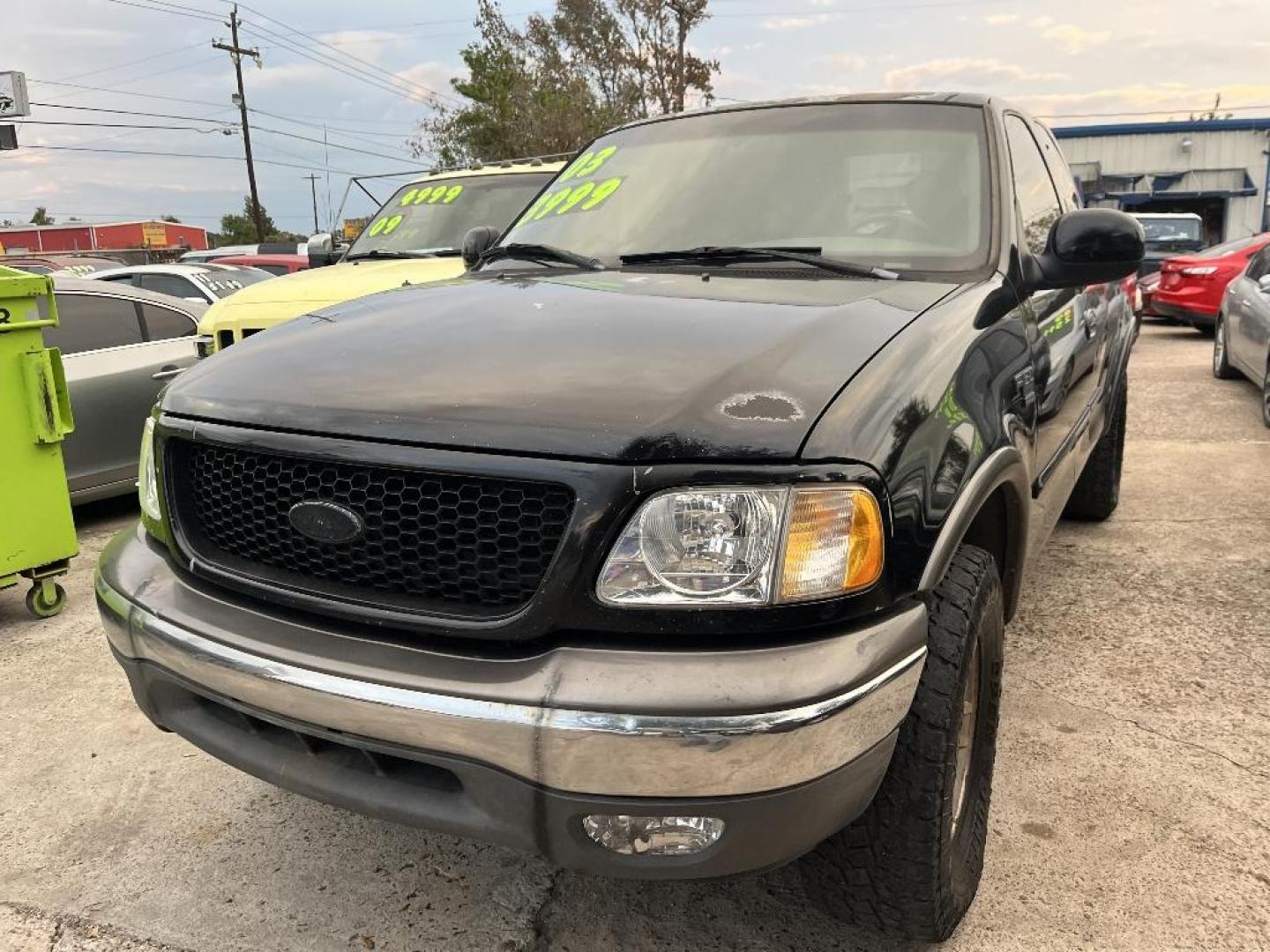 2003 BLACK FORD F-150 XL SuperCab 4WD (2FTRX18L23C) with an 5.4L V8 SOHC 16V engine, AUTOMATIC transmission, located at 2303 West Mt. Houston, Houston, 77038, (281) 507-3956, 29.771597, -95.339569 - Photo#0
