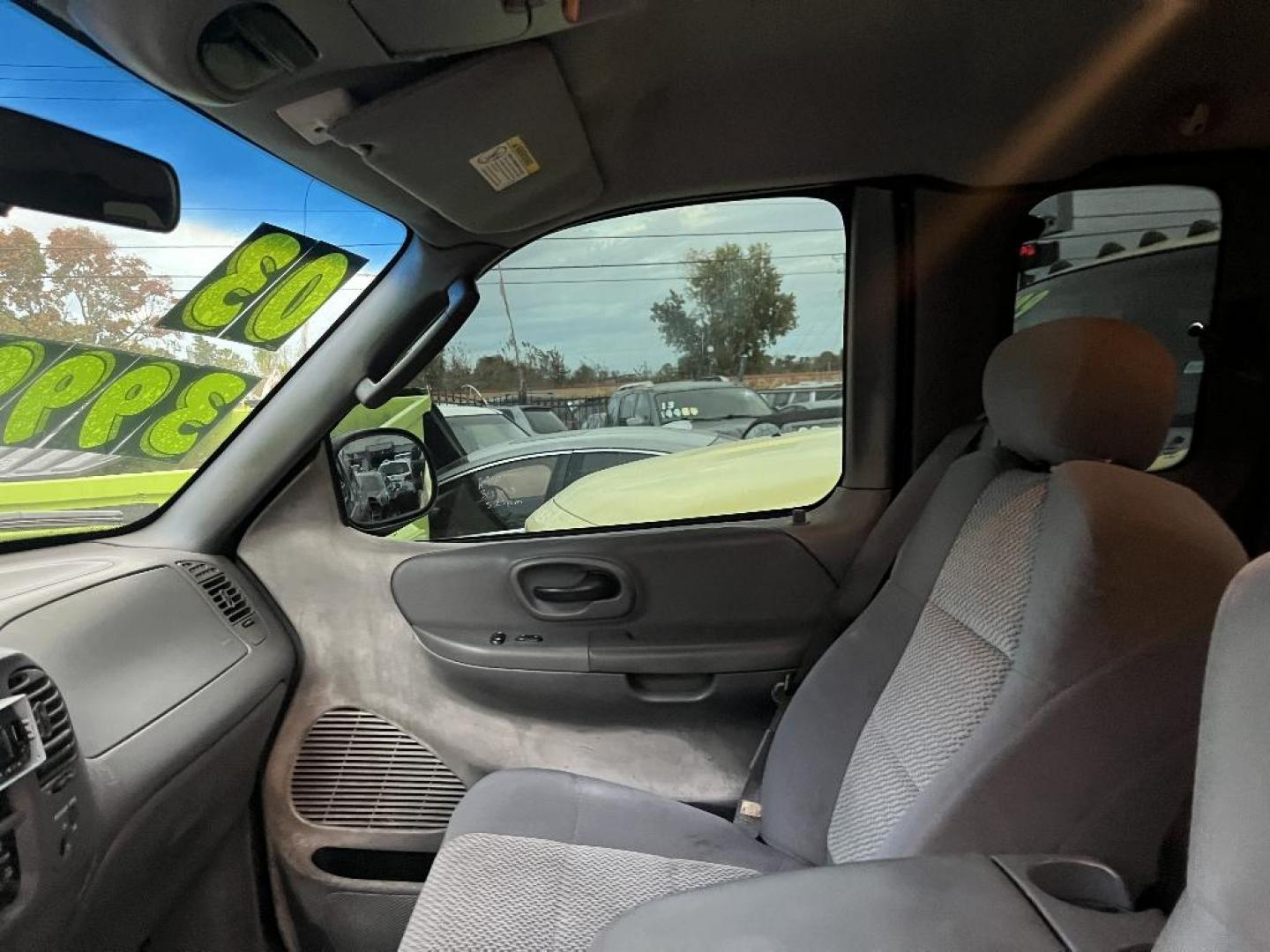 2003 BLACK FORD F-150 XL SuperCab 4WD (2FTRX18L23C) with an 5.4L V8 SOHC 16V engine, AUTOMATIC transmission, located at 2303 West Mt. Houston, Houston, 77038, (281) 507-3956, 29.771597, -95.339569 - Photo#2