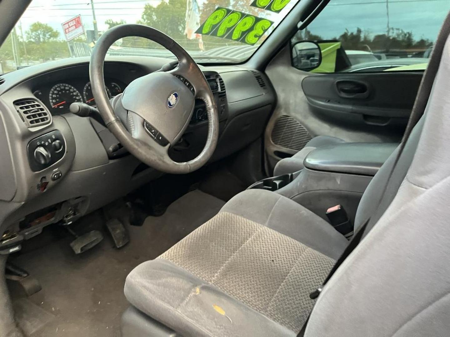 2003 BLACK FORD F-150 XL SuperCab 4WD (2FTRX18L23C) with an 5.4L V8 SOHC 16V engine, AUTOMATIC transmission, located at 2303 West Mt. Houston, Houston, 77038, (281) 507-3956, 29.771597, -95.339569 - Photo#4