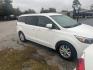 2016 WHITE KIA SEDONA LX (KNDMB5C17G6) with an 3.3L V6 DOHC 24V engine, AUTOMATIC transmission, located at 2303 West Mt. Houston, Houston, 77038, (281) 507-3956, 29.771597, -95.339569 - Photo#0