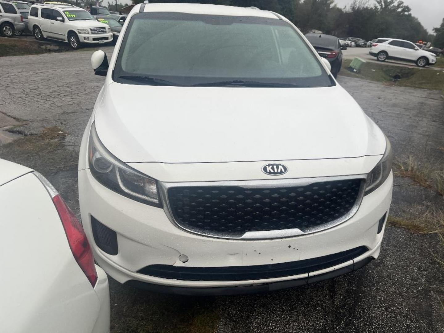 2016 WHITE KIA SEDONA LX (KNDMB5C17G6) with an 3.3L V6 DOHC 24V engine, AUTOMATIC transmission, located at 2303 West Mt. Houston, Houston, 77038, (281) 507-3956, 29.771597, -95.339569 - Photo#1
