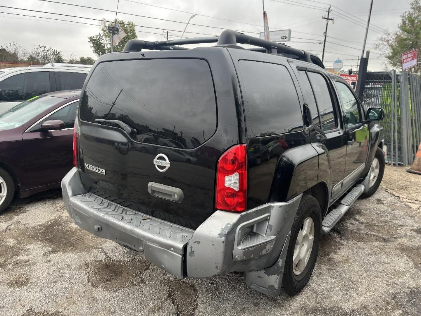 2005 BLACK NISSAN XTERRA OR 2WD (5N1AN08U85C) with an 4.0L V6 DOHC 24V engine, AUTOMATIC transmission, located at 2303 West Mt. Houston, Houston, 77038, (281) 507-3956, 29.771597, -95.339569 - Photo#5