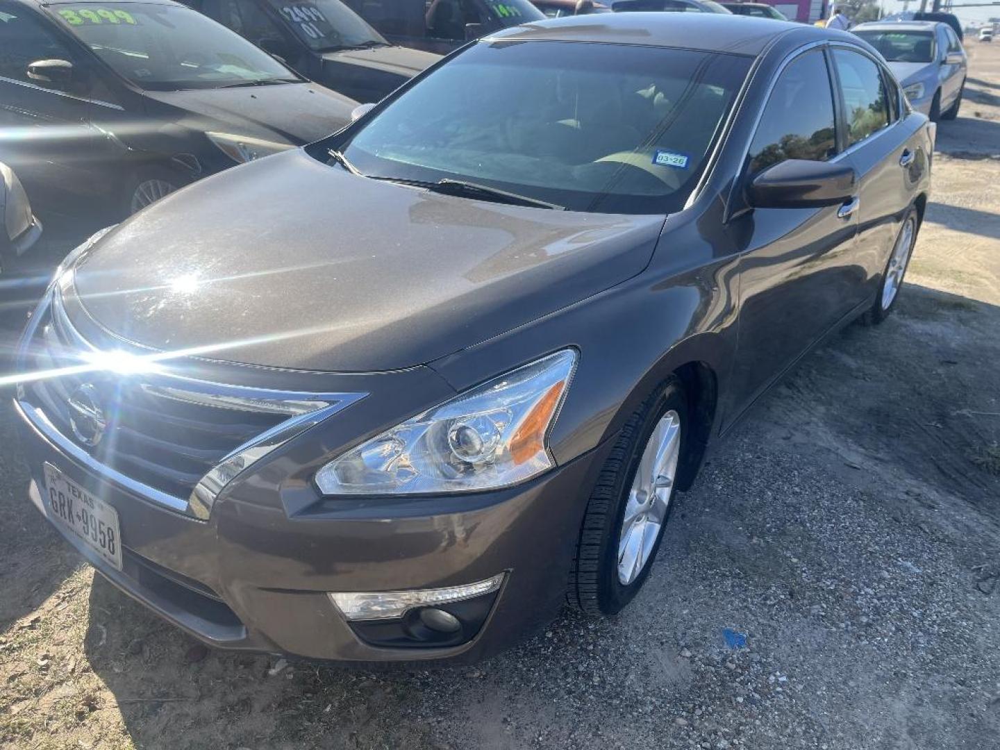 2015 BROWN NISSAN ALTIMA 2.5 S (1N4AL3AP9FC) with an 2.5L L4 DOHC 16V engine, AUTOMATIC transmission, located at 2303 West Mt. Houston, Houston, 77038, (281) 507-3956, 29.771597, -95.339569 - Photo#0