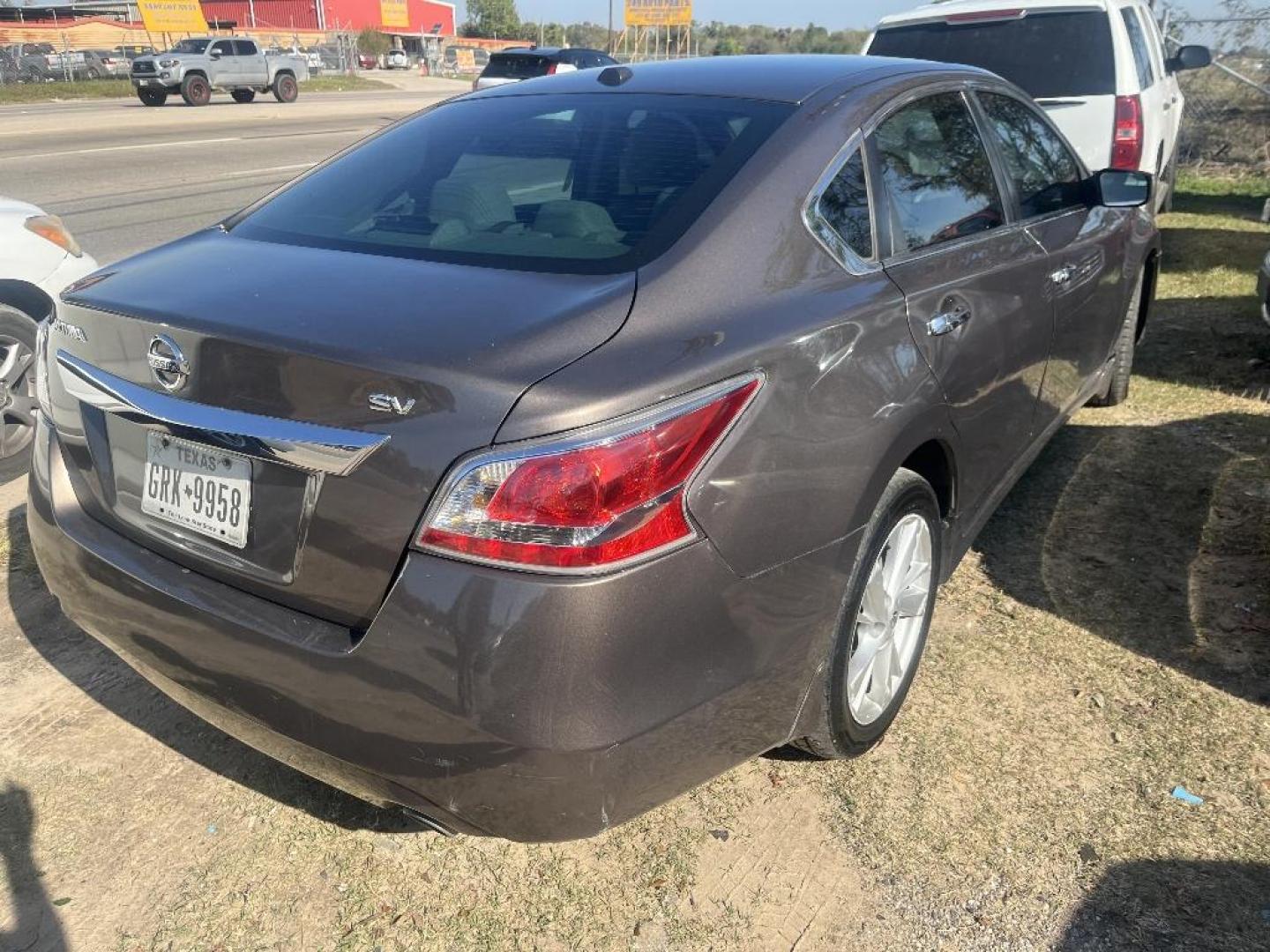 2015 BROWN NISSAN ALTIMA 2.5 S (1N4AL3AP9FC) with an 2.5L L4 DOHC 16V engine, AUTOMATIC transmission, located at 2303 West Mt. Houston, Houston, 77038, (281) 507-3956, 29.771597, -95.339569 - Photo#4