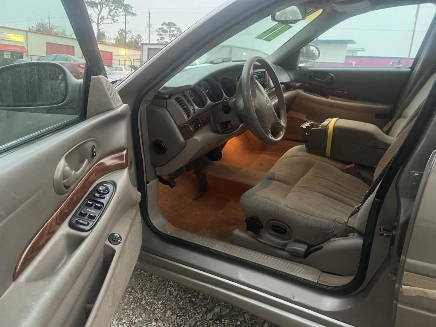 2002 BROWN BUICK LESABRE Custom (1G4HP54K92U) with an 3.8L V6 OHV 12V engine, AUTOMATIC transmission, located at 2303 West Mt. Houston, Houston, 77038, (281) 507-3956, 29.771597, -95.339569 - Photo#4