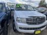 2010 WHITE LINCOLN NAVIGATOR L 4WD (5LMJJ3J55AE) with an 5.4L V8 SOHC 24V engine, AUTOMATIC transmission, located at 2303 West Mt. Houston, Houston, 77038, (281) 507-3956, 29.771597, -95.339569 - Photo#1
