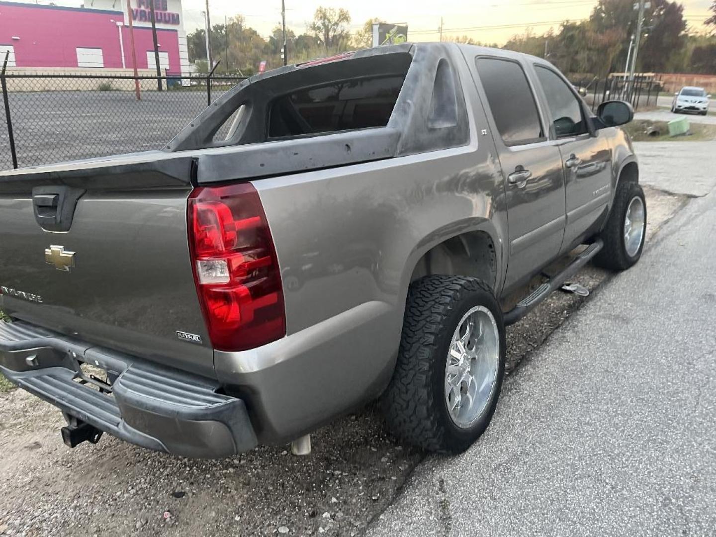 2007 BROWN CHEVROLET AVALANCHE LS 2WD (3GNEC12077G) with an 5.3L V8 OHV 16V FFV engine, AUTOMATIC transmission, located at 2303 West Mt. Houston, Houston, 77038, (281) 507-3956, 29.771597, -95.339569 - Photo#1