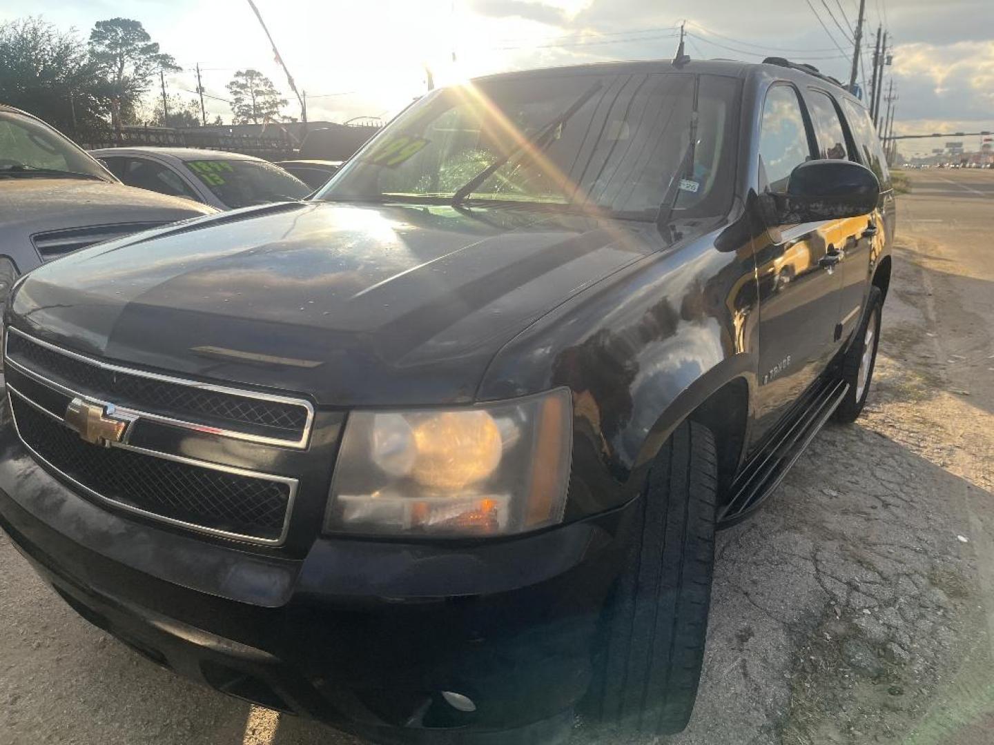 2007 BLACK CHEVROLET TAHOE LTZ 2WD (1GNFC13J37R) with an 5.3L V8 OHV 16V engine, AUTOMATIC transmission, located at 2303 West Mt. Houston, Houston, 77038, (281) 507-3956, 29.771597, -95.339569 - Photo#0