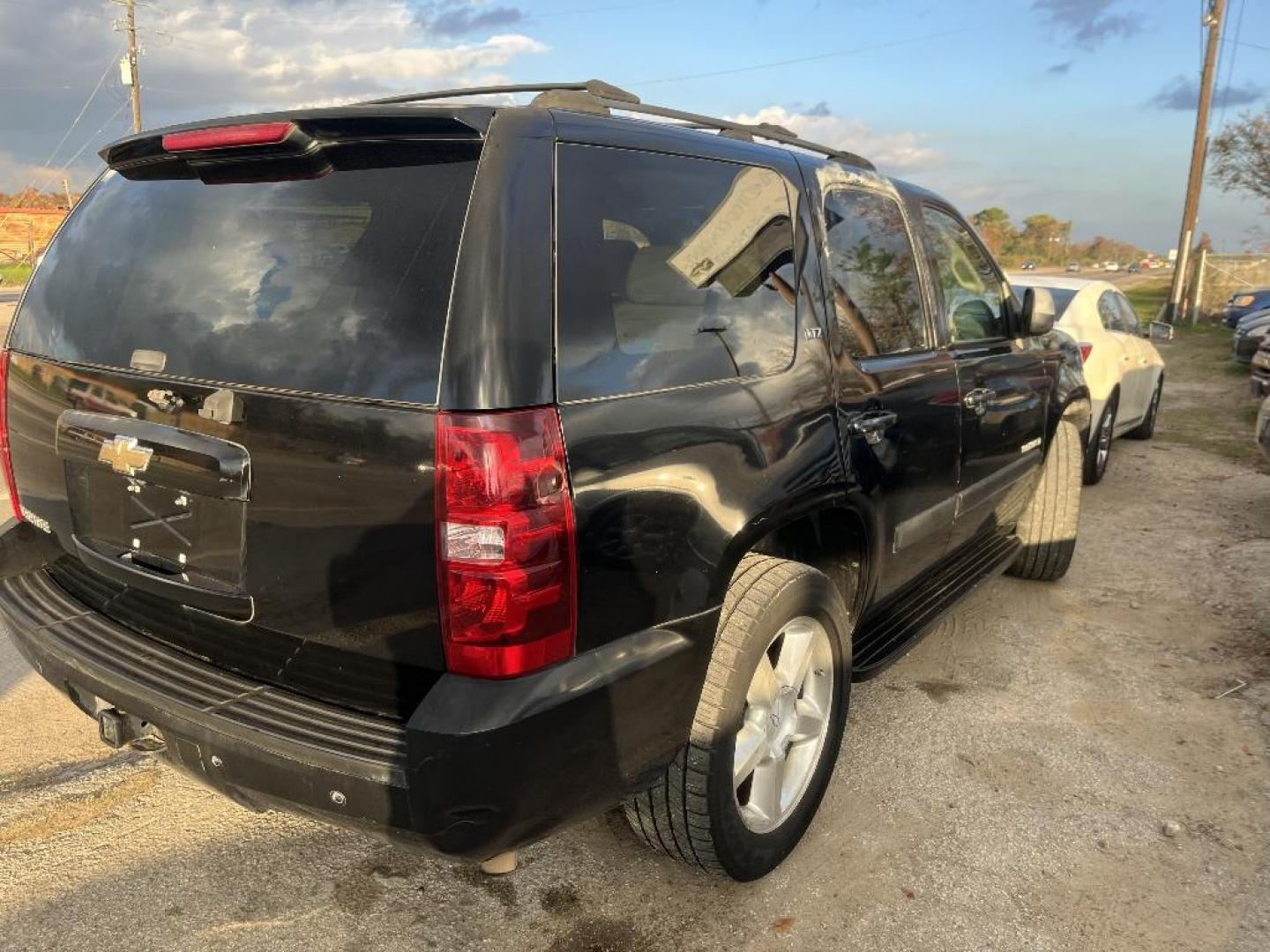2007 BLACK CHEVROLET TAHOE LTZ 2WD (1GNFC13J37R) with an 5.3L V8 OHV 16V engine, AUTOMATIC transmission, located at 2303 West Mt. Houston, Houston, 77038, (281) 507-3956, 29.771597, -95.339569 - Photo#3
