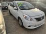 2013 WHITE NISSAN VERSA 1.6 S 5M (3N1CN7AP4DL) with an 1.6L L4 DOHC 16V engine, AUTOMATIC transmission, located at 2303 West Mt. Houston, Houston, 77038, (281) 507-3956, 29.771597, -95.339569 - Photo#0