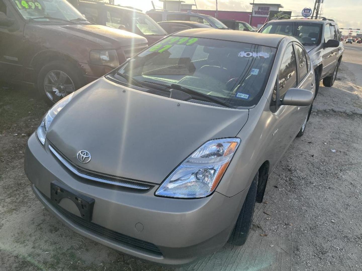 2007 BROWN TOYOTA PRIUS 4-Door Liftback (JTDKB20U477) with an 1.5L L4 DOHC 16V HYBRID engine, AUTOMATIC transmission, located at 2303 West Mt. Houston, Houston, 77038, (281) 507-3956, 29.771597, -95.339569 - Photo#1