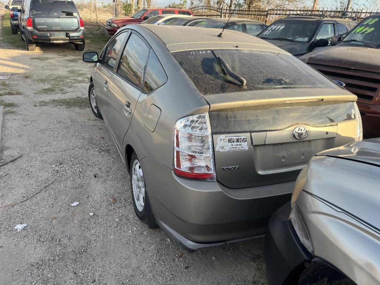 2007 BROWN TOYOTA PRIUS 4-Door Liftback (JTDKB20U477) with an 1.5L L4 DOHC 16V HYBRID engine, AUTOMATIC transmission, located at 2303 West Mt. Houston, Houston, 77038, (281) 507-3956, 29.771597, -95.339569 - Photo#3