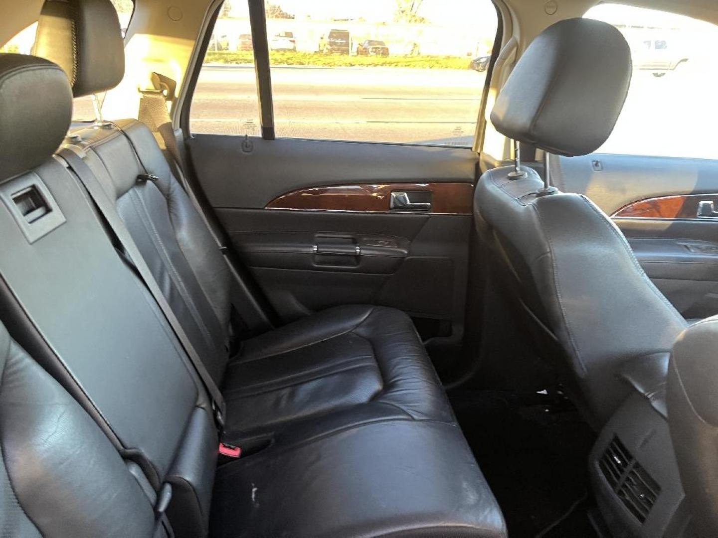 2013 BLACK LINCOLN MKX FWD (2LMDJ6JKXDB) with an 3.7L V6 DOHC 24V engine, AUTOMATIC transmission, located at 2303 West Mt. Houston, Houston, 77038, (281) 507-3956, 29.771597, -95.339569 - Photo#3