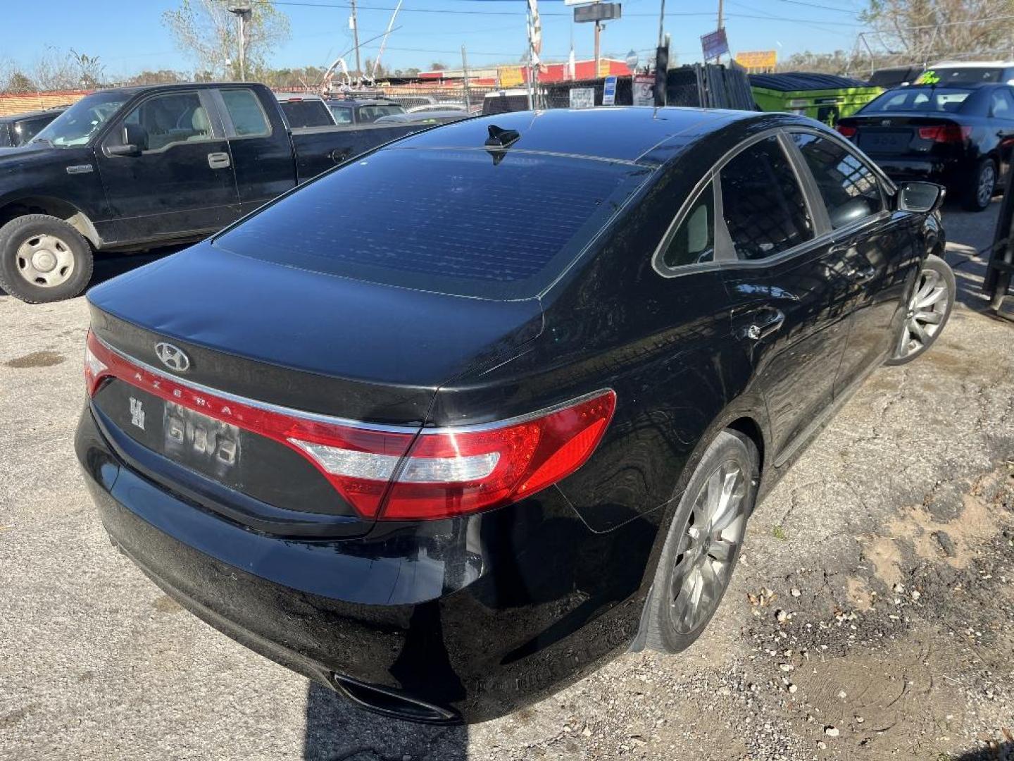 2013 BLACK HYUNDAI AZERA 3.3L (KMHFH4JG5DA) with an 3.3L V6 DOHC 24V engine, AUTOMATIC transmission, located at 2303 West Mt. Houston, Houston, 77038, (281) 507-3956, 29.771597, -95.339569 - Photo#4