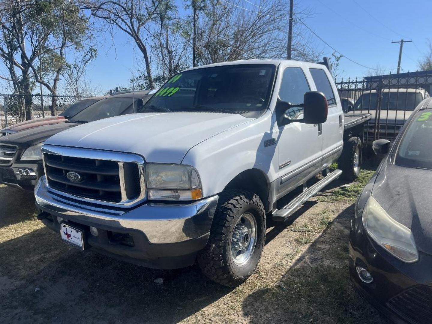 2004 WHITE FORD F-250 SD XLT Crew Cab 4WD (1FTNW21P14E) with an 6.0L V8 OHV 32V TURBO DIESEL engine, AUTOMATIC transmission, located at 2303 West Mt. Houston, Houston, 77038, (281) 507-3956, 29.771597, -95.339569 - Photo#0