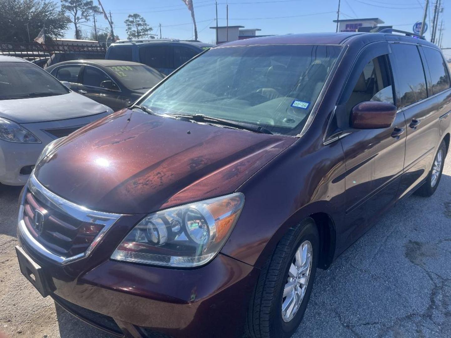 2008 RED HONDA ODYSSEY EX-L w/ DVD (5FNRL38748B) with an 3.5L V6 SOHC 24V engine, AUTOMATIC transmission, located at 2303 West Mt. Houston, Houston, 77038, (281) 507-3956, 29.771597, -95.339569 - Photo#0