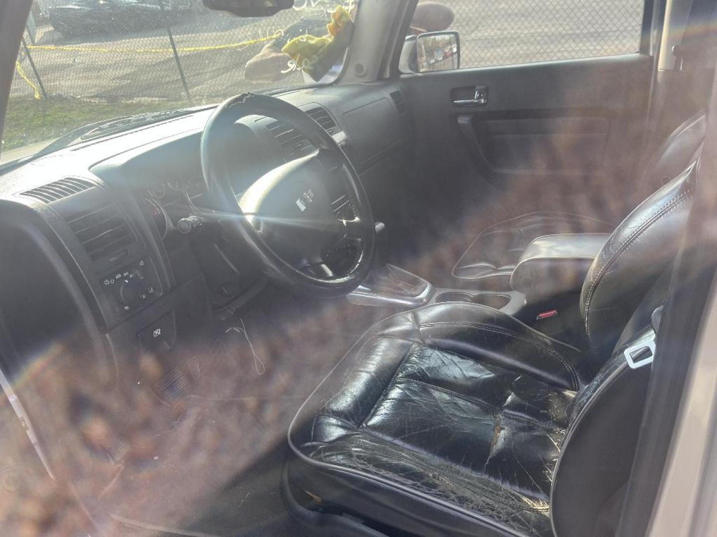 2006 BROWN HUMMER H3 Sport Utility (5GTDN136668) with an 3.5L L5 DOHC 20V engine, AUTOMATIC transmission, located at 2303 West Mt. Houston, Houston, 77038, (281) 507-3956, 29.771597, -95.339569 - Photo#3