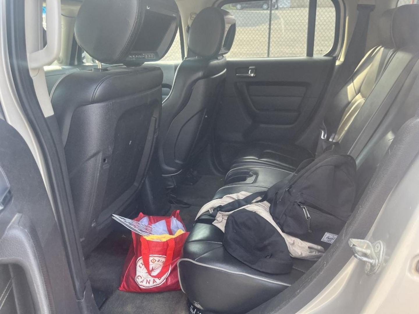 2006 BROWN HUMMER H3 Sport Utility (5GTDN136668) with an 3.5L L5 DOHC 20V engine, AUTOMATIC transmission, located at 2303 West Mt. Houston, Houston, 77038, (281) 507-3956, 29.771597, -95.339569 - Photo#4