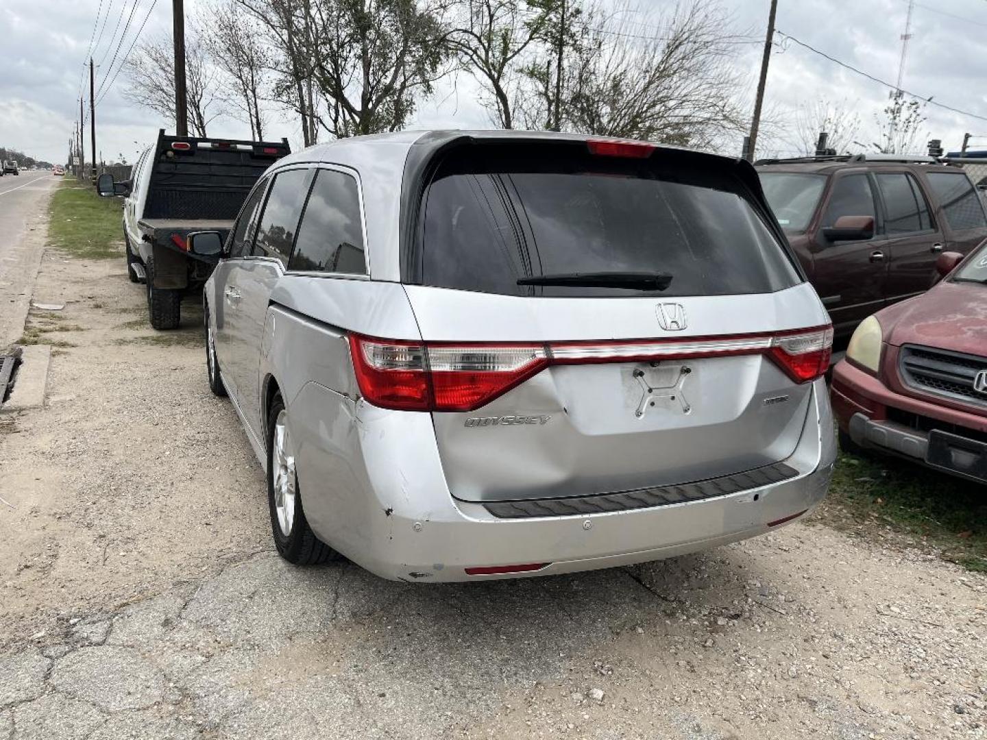 2012 GRAY HONDA ODYSSEY Touring (5FNRL5H98CB) with an 3.5L V6 SOHC 24V engine, AUTOMATIC transmission, located at 2303 West Mt. Houston, Houston, 77038, (281) 507-3956, 29.771597, -95.339569 - Photo#1
