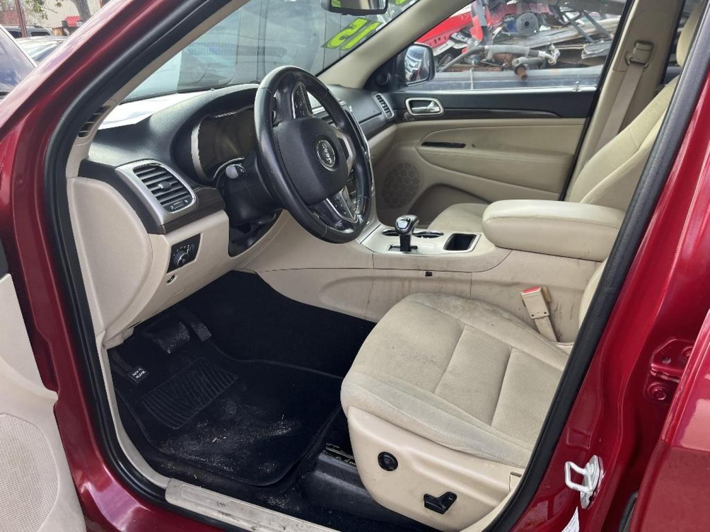 2015 RED JEEP GRAND CHEROKEE Laredo 2WD (1C4RJEAG5FC) with an 3.6L V6 DOHC 24V engine, AUTOMATIC transmission, located at 2303 West Mt. Houston, Houston, 77038, (281) 507-3956, 29.771597, -95.339569 - Photo#2