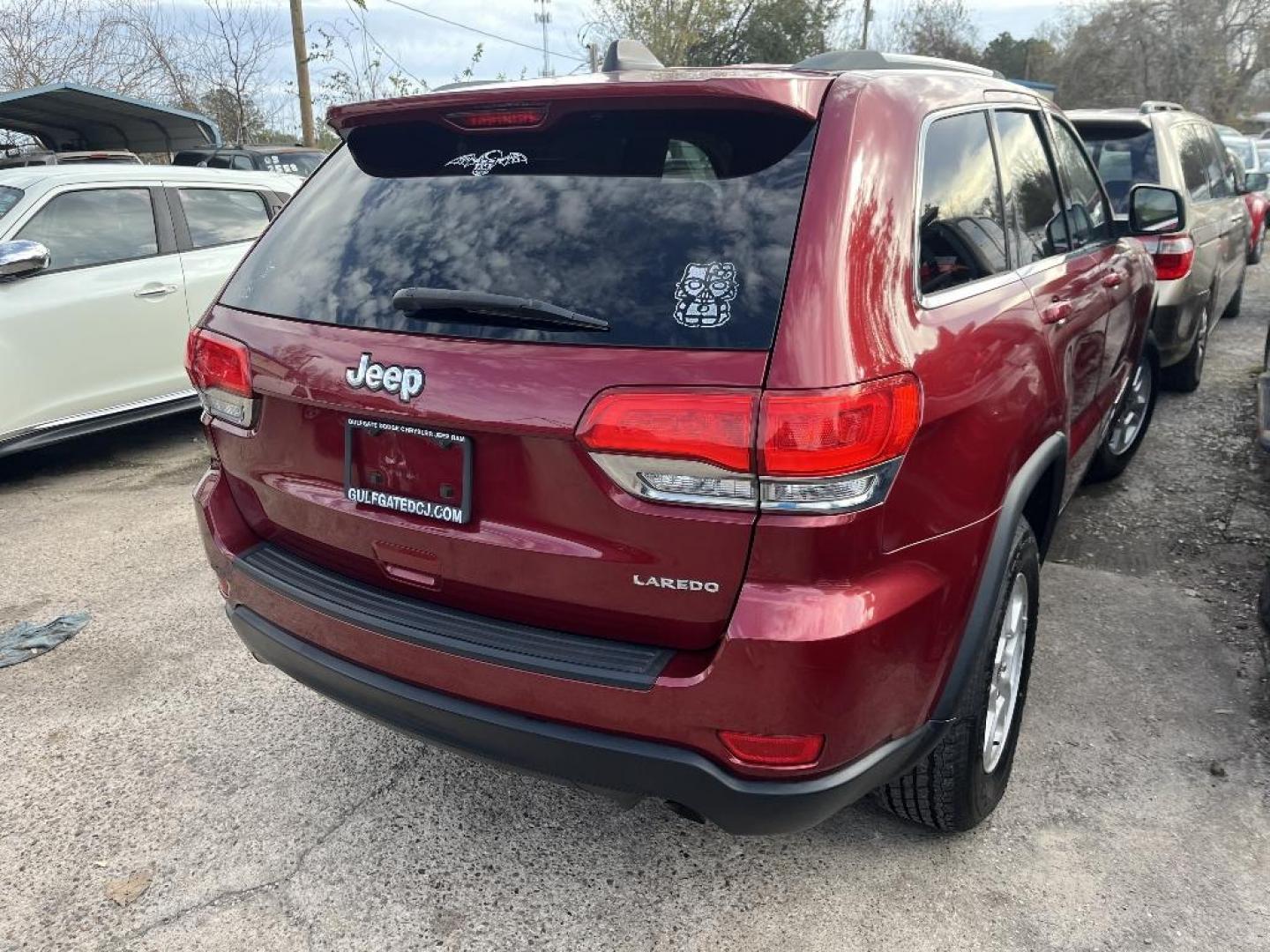 2015 RED JEEP GRAND CHEROKEE Laredo 2WD (1C4RJEAG5FC) with an 3.6L V6 DOHC 24V engine, AUTOMATIC transmission, located at 2303 West Mt. Houston, Houston, 77038, (281) 507-3956, 29.771597, -95.339569 - Photo#3