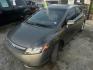 2007 GRAY HONDA CIVIC EX Sedan AT (1HGFA16897L) with an 1.8L L4 SOHC 16V engine, AUTOMATIC transmission, located at 2303 West Mt. Houston, Houston, 77038, (281) 507-3956, 29.771597, -95.339569 - Photo#0
