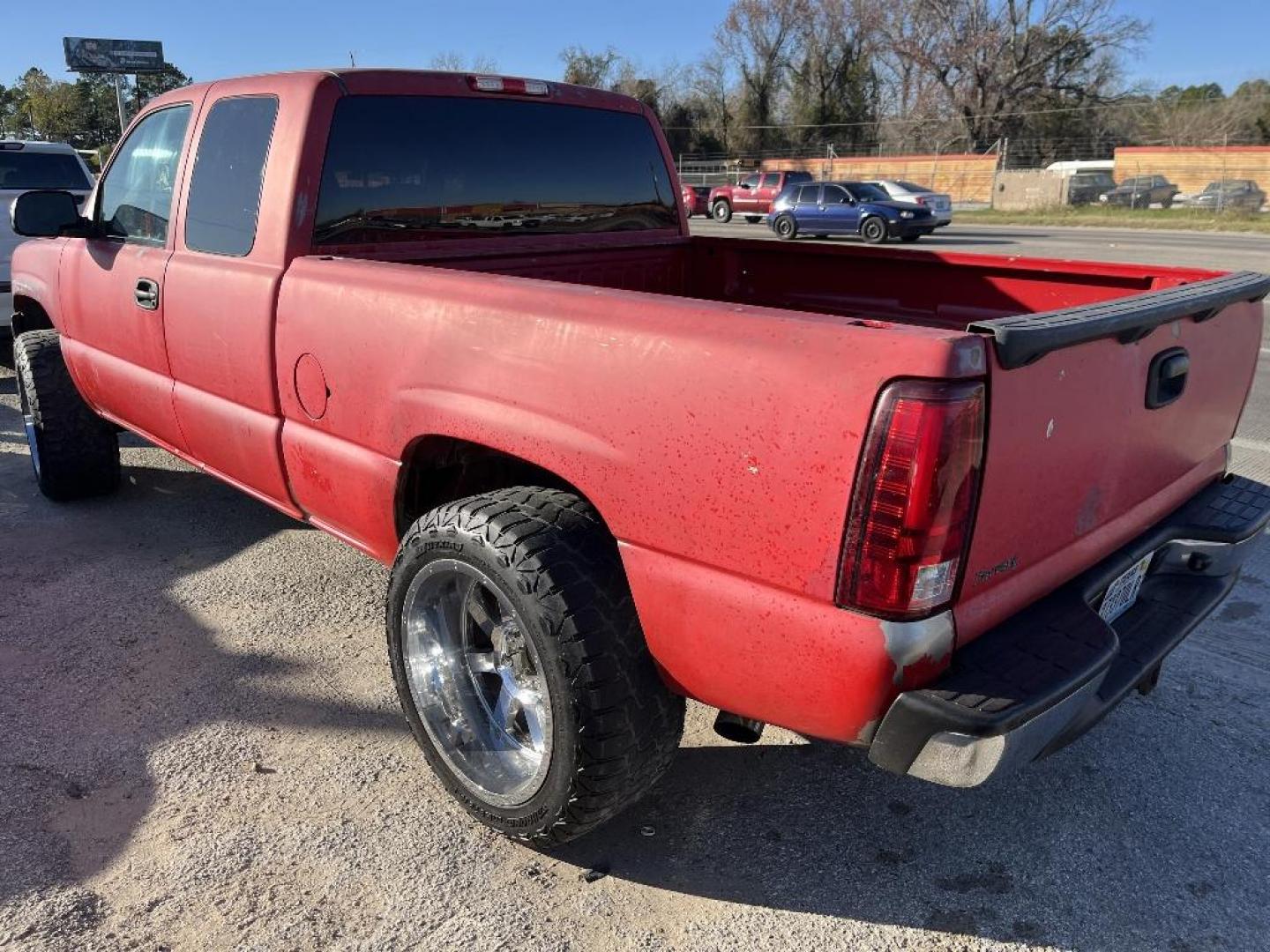 1999 RED CHEVROLET SILVERADO 1500 Ext. Cab Short Bed 4WD (1GCEK19VXXE) with an 4.8L V8 OHV 16V engine, AUTOMATIC transmission, located at 2303 West Mt. Houston, Houston, 77038, (281) 507-3956, 29.771597, -95.339569 - Photo#1