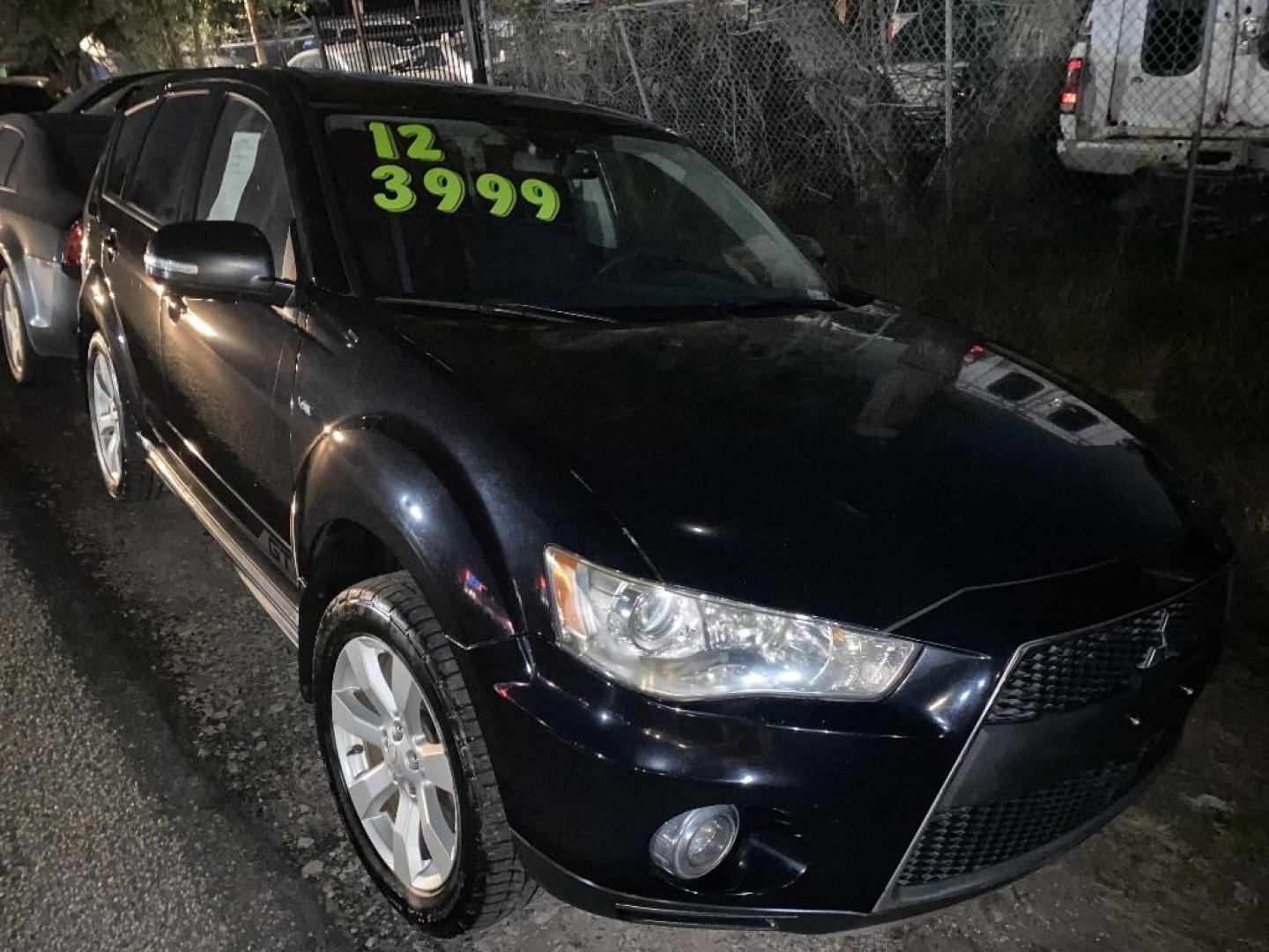 2012 BLACK MITSUBISHI OUTLANDER SE 2WD (JA4JS4AXXCU) with an 3.0L V6 SOHC 24V engine, AUTOMATIC transmission, located at 2303 West Mt. Houston, Houston, 77038, (281) 507-3956, 29.771597, -95.339569 - Photo#1