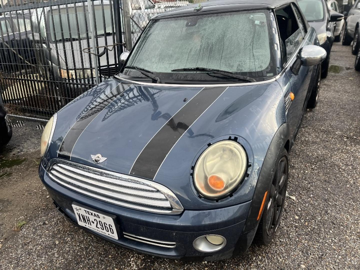 2009 BLUE MINI COOPER Convertible (WMWMR33569T) with an 1.6L L4 DOHC 16V engine, AUTOMATIC transmission, located at 2303 West Mt. Houston, Houston, 77038, (281) 507-3956, 29.771597, -95.339569- Photo#1
