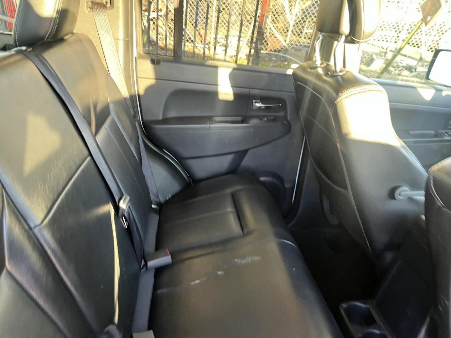 2012 WHITE JEEP LIBERTY Sport 2WD (1C4PJLAK5CW) with an 3.7L V6 SOHC 12V engine, AUTOMATIC transmission, located at 2303 West Mt. Houston, Houston, 77038, (281) 507-3956, 29.771597, -95.339569 - Photo#4