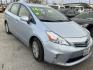 2014 BLUE TOYOTA PRIUS V Three (JTDZN3EU6E3) with an 1.8L L4 DOHC 16V HYBRID engine, AUTOMATIC transmission, located at 2303 West Mt. Houston, Houston, 77038, (281) 507-3956, 29.771597, -95.339569 - Photo#0