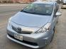 2014 BLUE TOYOTA PRIUS V Three (JTDZN3EU6E3) with an 1.8L L4 DOHC 16V HYBRID engine, AUTOMATIC transmission, located at 2303 West Mt. Houston, Houston, 77038, (281) 507-3956, 29.771597, -95.339569 - Photo#1