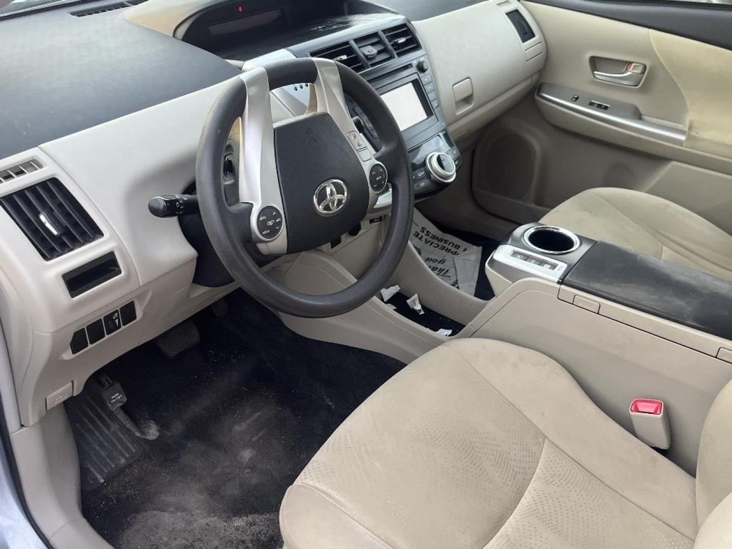 2014 BLUE TOYOTA PRIUS V Three (JTDZN3EU6E3) with an 1.8L L4 DOHC 16V HYBRID engine, AUTOMATIC transmission, located at 2303 West Mt. Houston, Houston, 77038, (281) 507-3956, 29.771597, -95.339569 - Photo#5