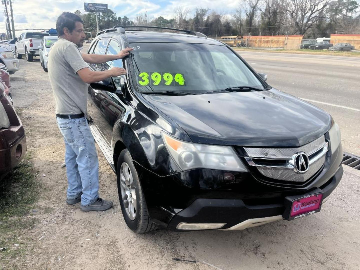 2007 BLACK ACURA MDX Tech Package with Rear DVD System (2HNYD28457H) with an 3.7L V6 SOHC 24V engine, AUTOMATIC transmission, located at 2303 West Mt. Houston, Houston, 77038, (281) 507-3956, 29.771597, -95.339569 - Photo#1
