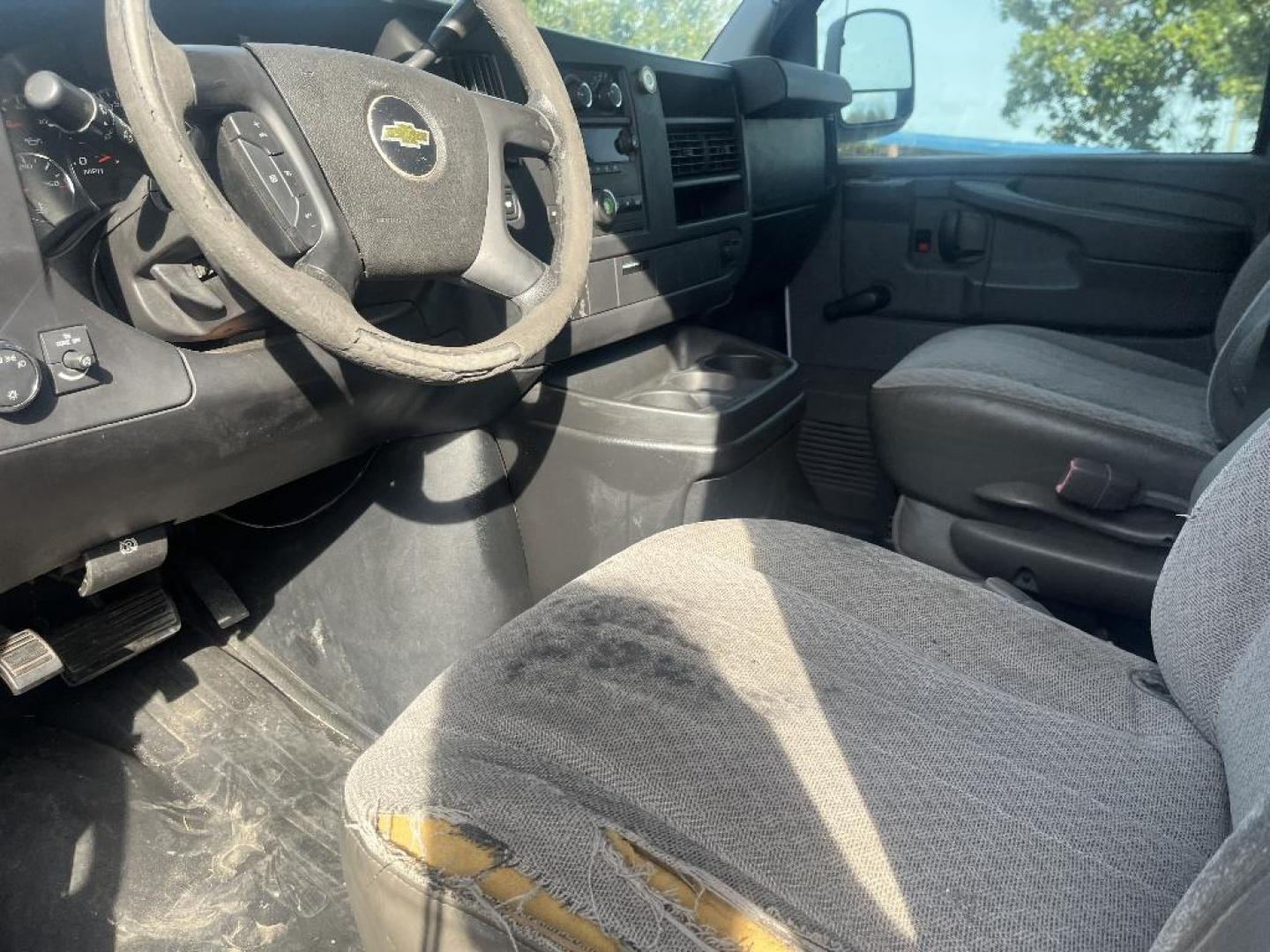 2013 WHITE CHEVROLET EXPRESS 1500 Cargo (1GCSGAFX8D1) with an 4.3L V6 OHV 12V engine, AUTOMATIC transmission, located at 2303 West Mt. Houston, Houston, 77038, (281) 507-3956, 29.771597, -95.339569 - Photo#2