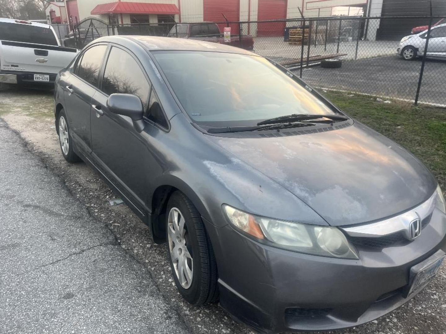 2010 GRAY HONDA CIVIC LX Sedan 5-Speed AT (2HGFA1F50AH) with an 1.8L L4 SOHC 16V engine, AUTOMATIC transmission, located at 2303 West Mt. Houston, Houston, 77038, (281) 507-3956, 29.771597, -95.339569 - Photo#0