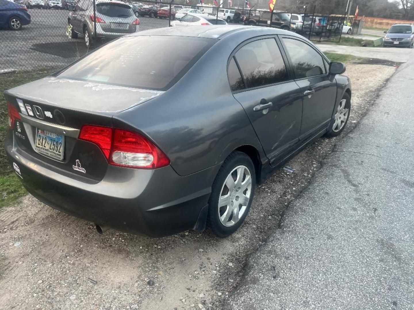 2010 GRAY HONDA CIVIC LX Sedan 5-Speed AT (2HGFA1F50AH) with an 1.8L L4 SOHC 16V engine, AUTOMATIC transmission, located at 2303 West Mt. Houston, Houston, 77038, (281) 507-3956, 29.771597, -95.339569 - Photo#1
