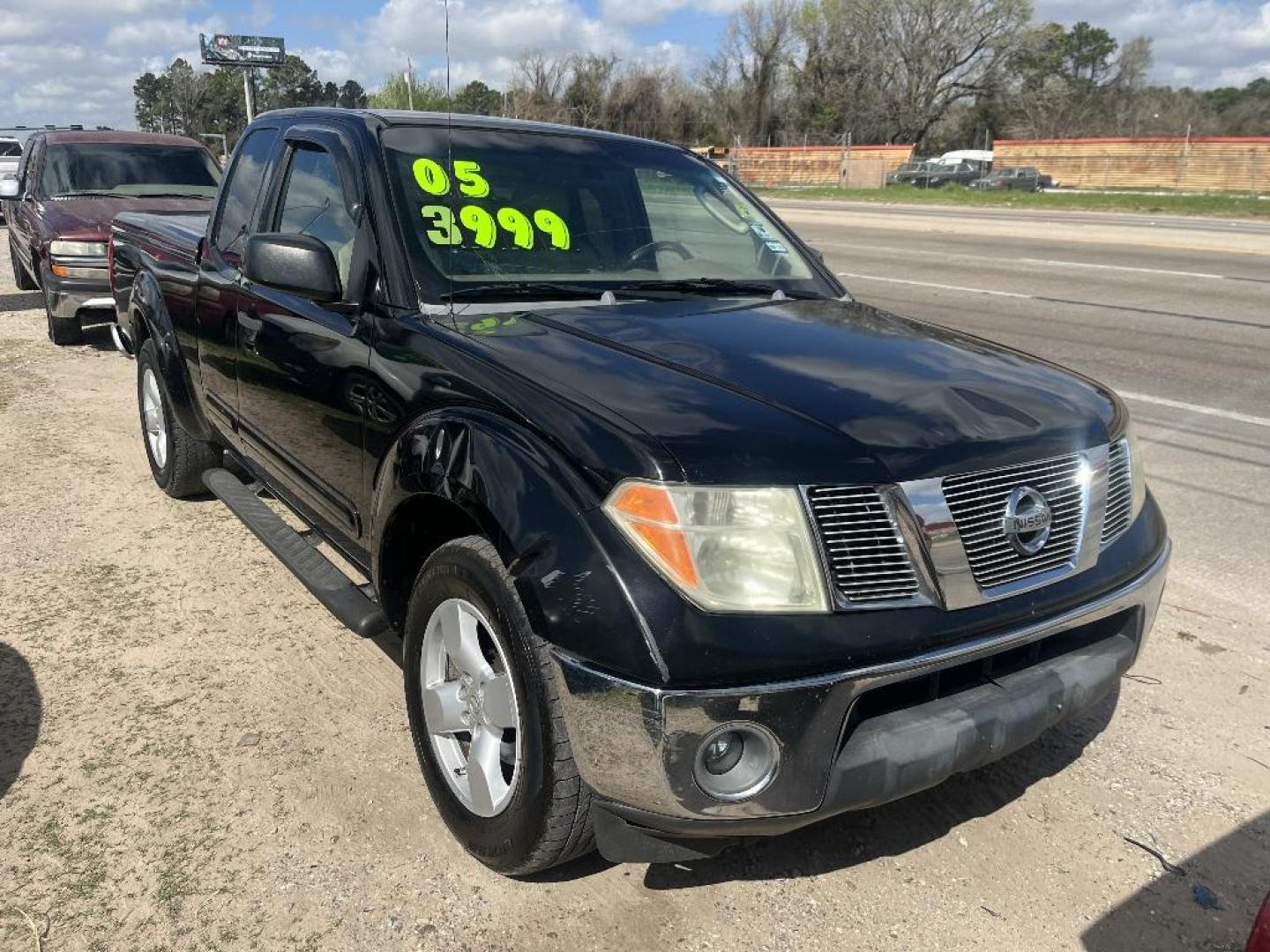2005 BLACK NISSAN FRONTIER SE King Cab 2WD (1N6AD06U15C) with an 4.0L V6 DOHC 24V engine, AUTOMATIC transmission, located at 2303 West Mt. Houston, Houston, 77038, (281) 507-3956, 29.771597, -95.339569 - Photo#2