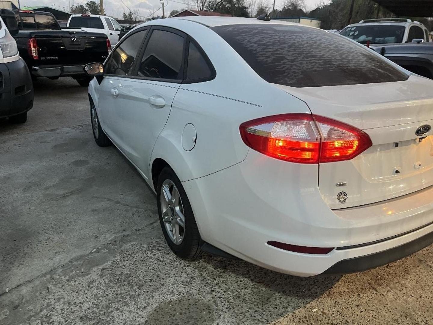 2019 WHITE FORD FIESTA SE Sedan (3FADP4BJ2KM) with an 1.6L L4 DOHC 16V engine, AUTOMATIC transmission, located at 2303 West Mt. Houston, Houston, 77038, (281) 507-3956, 29.771597, -95.339569 - Photo#3