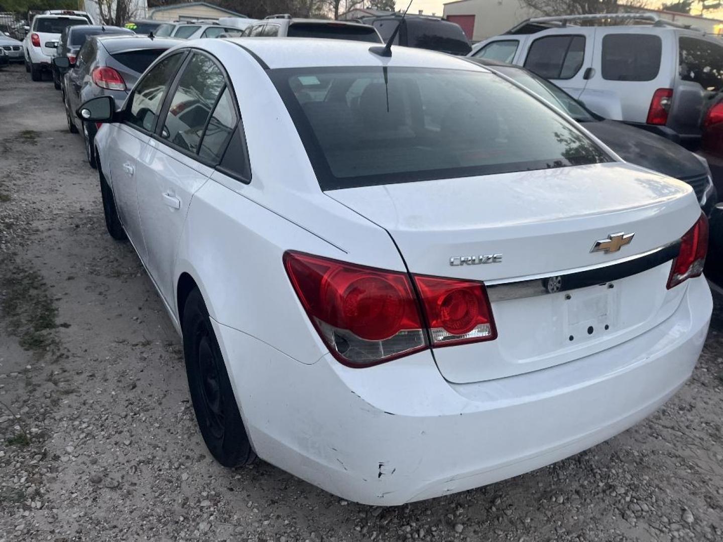 2013 WHITE CHEVROLET CRUZE LS Auto (1G1PA5SHXD7) with an 1.8L L4 DOHC 16V FFV engine, AUTOMATIC transmission, located at 2303 West Mt. Houston, Houston, 77038, (281) 507-3956, 29.771597, -95.339569 - Photo#1