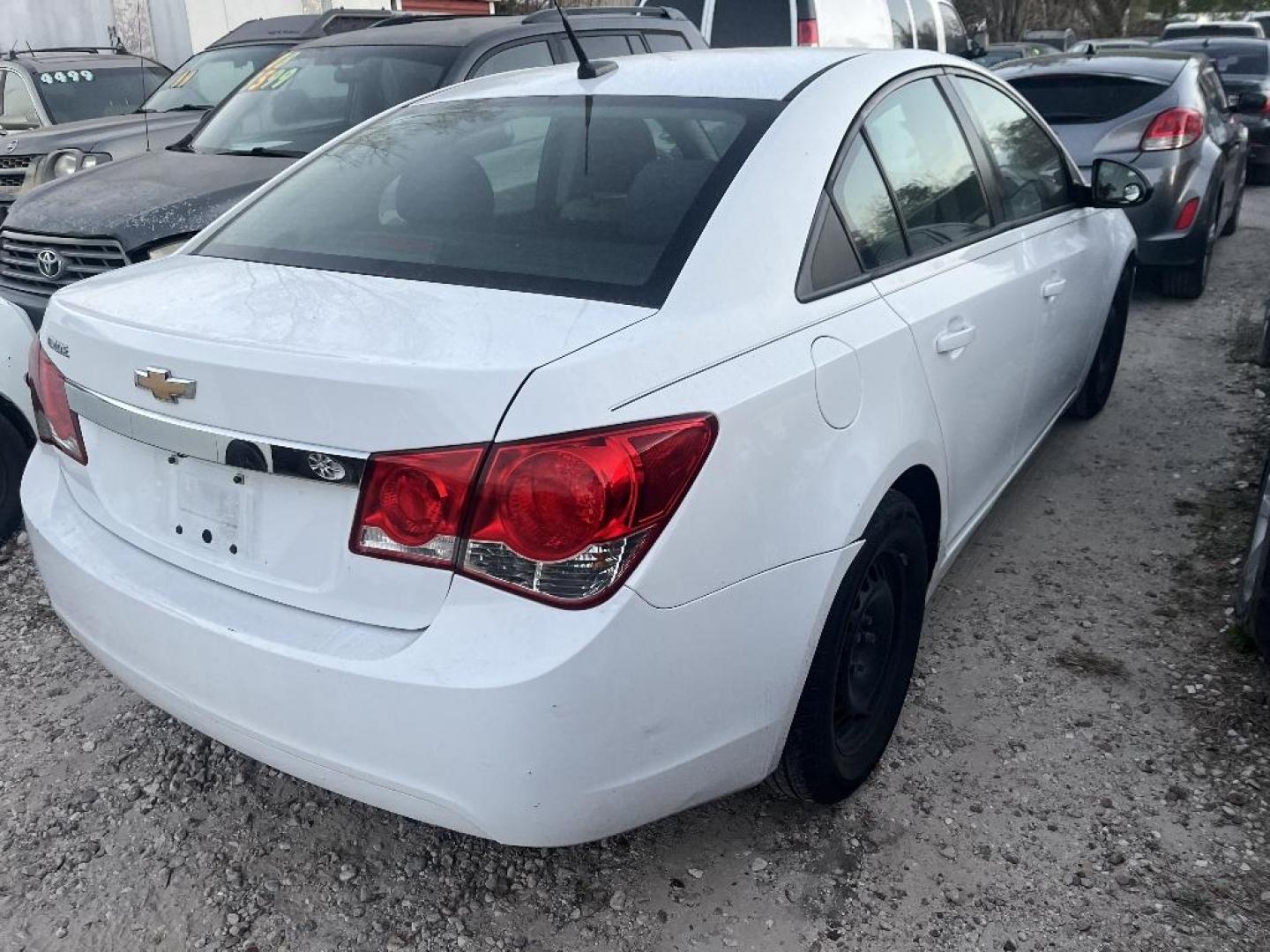 2013 WHITE CHEVROLET CRUZE LS Auto (1G1PA5SHXD7) with an 1.8L L4 DOHC 16V FFV engine, AUTOMATIC transmission, located at 2303 West Mt. Houston, Houston, 77038, (281) 507-3956, 29.771597, -95.339569 - Photo#3