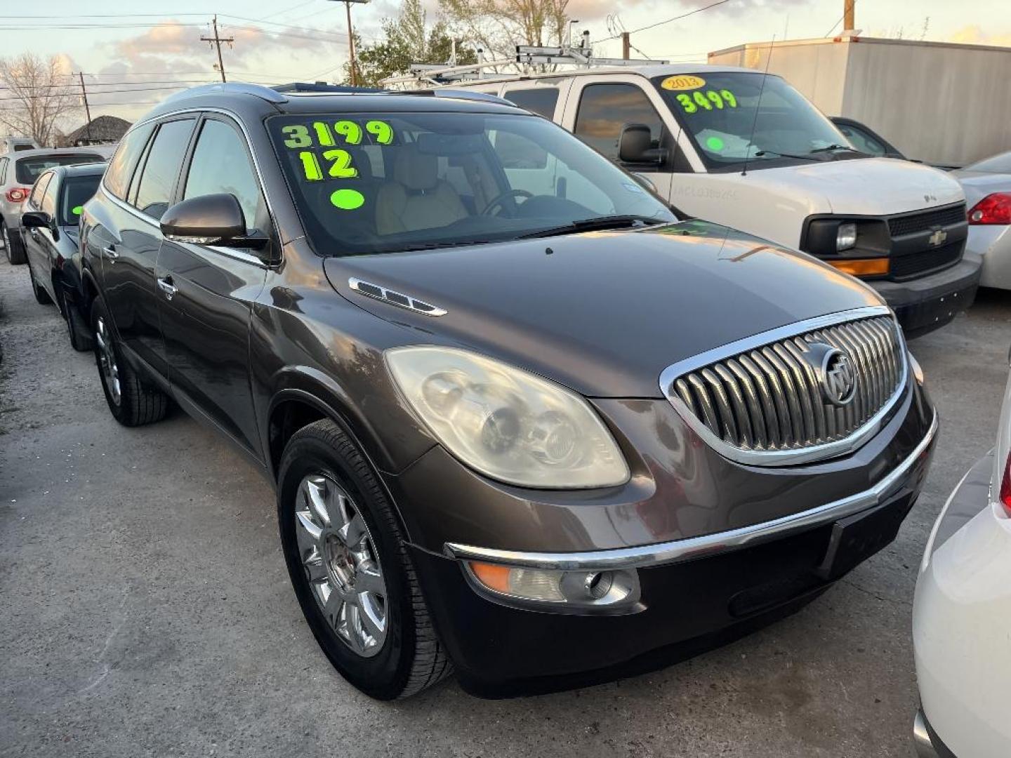 2012 BROWN BUICK ENCLAVE Premium FWD (5GAKRDED4CJ) with an 3.6L V6 DOHC 24V engine, AUTOMATIC transmission, located at 2303 West Mt. Houston, Houston, 77038, (281) 507-3956, 29.771597, -95.339569 - Photo#0