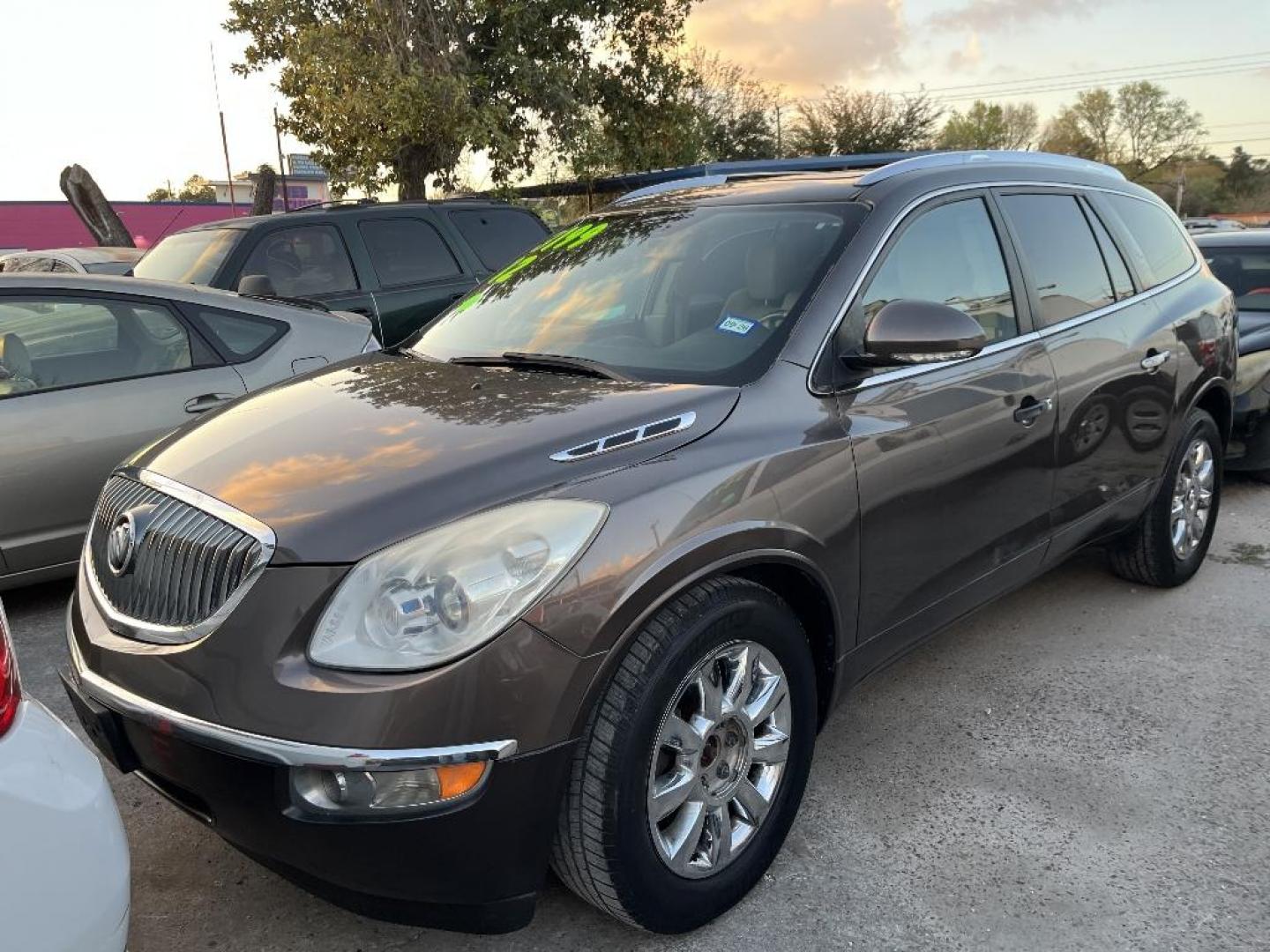 2012 BROWN BUICK ENCLAVE Premium FWD (5GAKRDED4CJ) with an 3.6L V6 DOHC 24V engine, AUTOMATIC transmission, located at 2303 West Mt. Houston, Houston, 77038, (281) 507-3956, 29.771597, -95.339569 - Photo#1