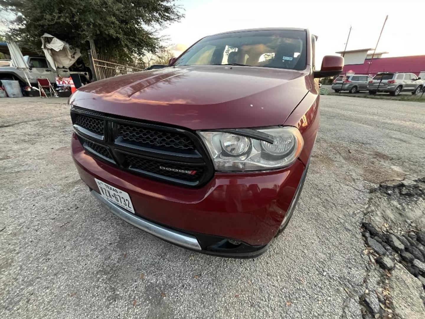 2013 RED DODGE DURANGO SXT RWD (1C4RDHAG4DC) with an 3.6L V6 DOHC 24V engine, AUTOMATIC transmission, located at 2303 West Mt. Houston, Houston, 77038, (281) 507-3956, 29.771597, -95.339569 - Photo#0